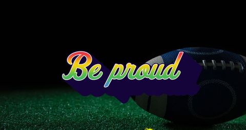 Rugby ball on grass with pride message in bright colors