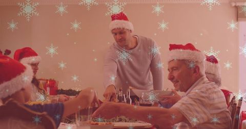 Family Christmas Dinner with Santa Hats and Snowflakes