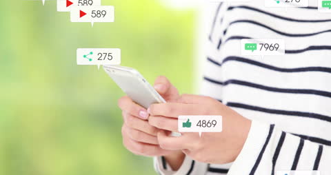 Hands Using Smartphone with Multiple Social Media Notifications