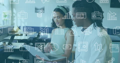 Diverse Coworkers Collaborating on Laptop with Overlay of Digital Icons