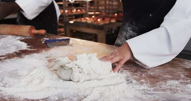 Baker Kneading Dough in Artisan Bakery Kitchen - Download Free Stock Images Pikwizard.com