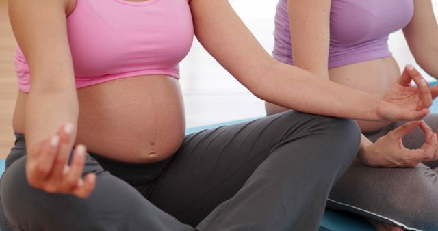 Pregnant Women Practicing Yoga for Relaxation and Well-being - Download Free Stock Images Pikwizard.com