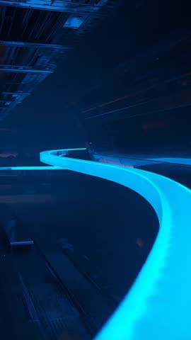 Moving camera revealing neon cyan curved rail through dark industrial corridor