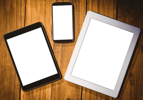 digital gadgets flat lay on wooden transparent background - Download Free Stock Videos Pikwizard.com