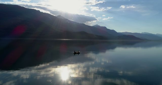 Serene Morning Paddle on Tranquil Mountain Lake - Download Free Stock Images Pikwizard.com