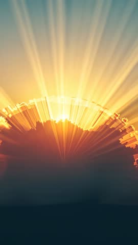 Vertical Sunrise Over Horizon Casting Golden Crepuscular Rays Through Cloud Bank