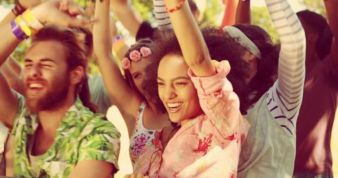 Diverse Young Adults Smiling at Outdoor Music Festival