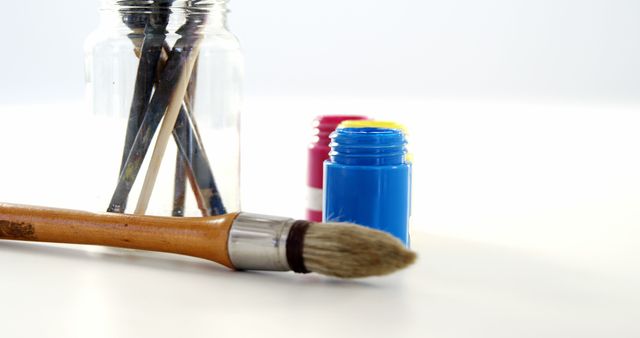 Colorful Art Supplies with Paintbrush and Paint Bottles - Download Free Stock Images Pikwizard.com