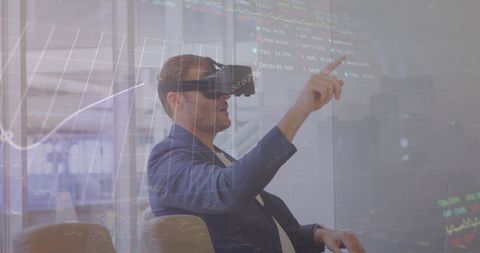 Businessman Using VR Headset Amidst Virtual Financial Data - Download Free Stock Images Pikwizard.com