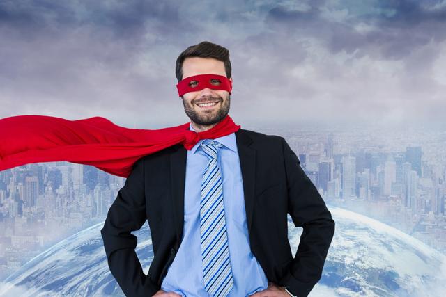 Businessman confidently posing in superhero costume with cityscape in background. He exudes motivation and empowerment, suggesting strong leadership and professional success. Useful for promoting corporate services, business success stories, motivational materials, and leadership training programs.