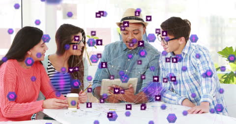 Diverse Team Collaborating with Tablet and Digital Icons