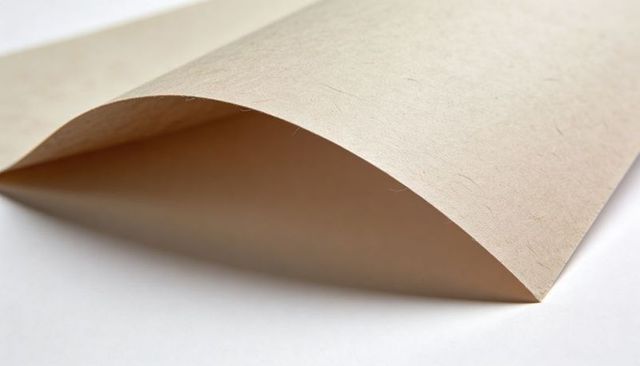 Curved Beige Kraft Paper Arch Casting Soft Triangle Shadow Minimal Textured Background