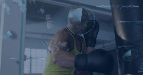 Muscular boxer striking heavy bag, training under futuristic hud analytics data overlays