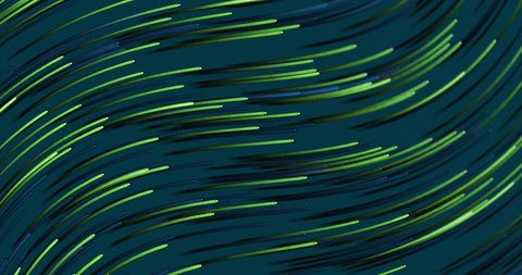 Green light trails over blue background in motion