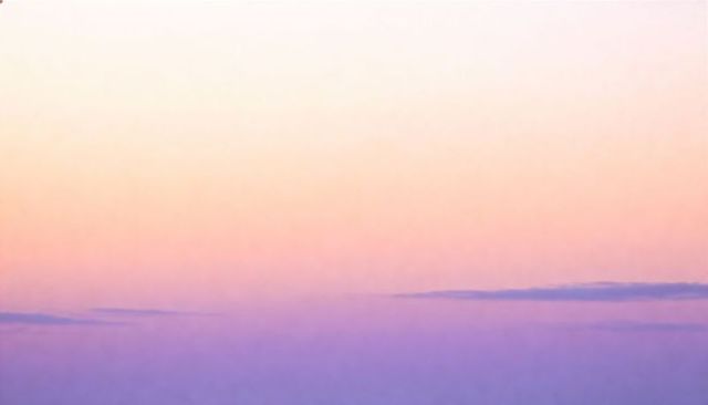 Pastel dawn gradient over coastal horizon with misty clouds for minimal calm background