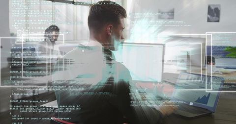 Software developer writing code in modern workspace