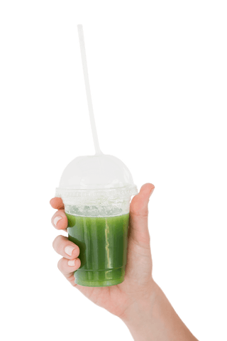 hand holding green juice with transparent lid and straw - Download Free Stock Videos Pikwizard.com