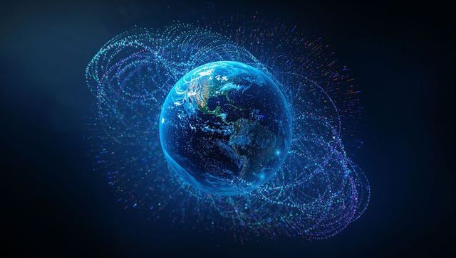 Rotating earth globe with digital particle rings, connected nodes and futuristic data orbit