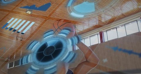 Basketball player shooting jump shot under futuristic blue hud overlay in indoor court