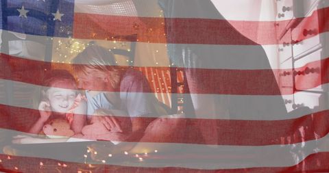 Mother and Daughter Enjoy Adventure Beneath Cozy Blanket Fort