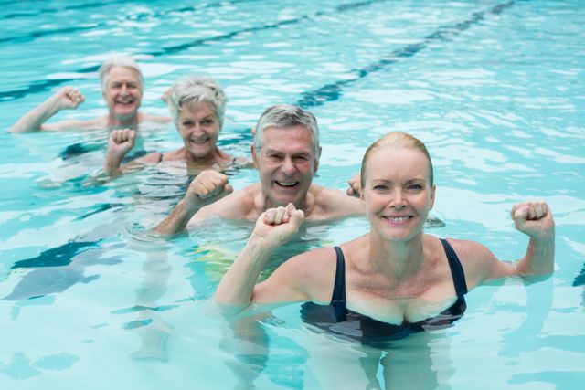Senior Adults Enjoying Water Aerobics in Swimming Pool - Download Free Stock Photos Pikwizard.com