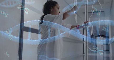 Young patient with iv drip and dna overlay in hospital corridor