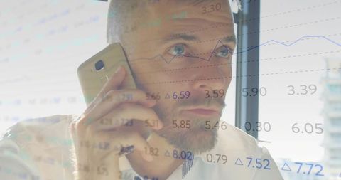 Professional Analyzing Financial Data on Smartphone by Office Window