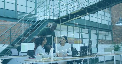 Diverse Business Team Collaborating in Modern Loft Office