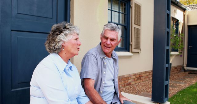 Elderly Couple Relaxing and Talking Outside Home - Download Free Stock Images Pikwizard.com