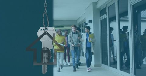 Diverse Team Discussing Property Investment with Key Overlay