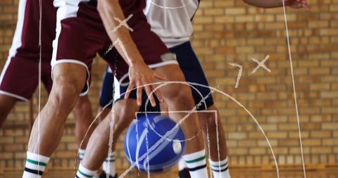 Basketball players in action with strategy overlays