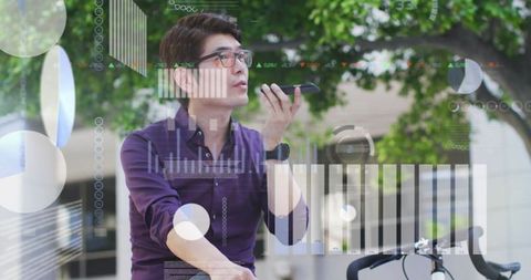 Businessman Communicating Through Smartphone Amidst Digital Data Overlay