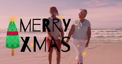 Joyful Mature Couple Walking on Beach Celebrating Christmas