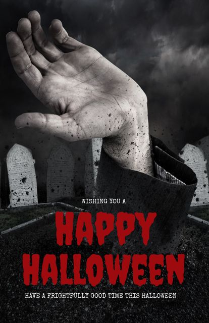 Celebrating Halloween, a hand emerging from the ground in a graveyard ...