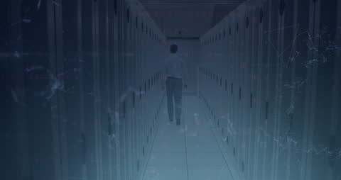 Engineer Analyzing Server Room Data with Cyber Security Overlay