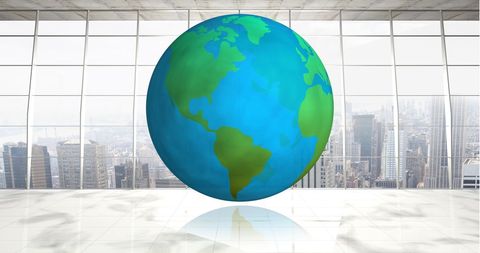 Modern Office with Spinning Globe and City View - Download Free Stock Images Pikwizard.com