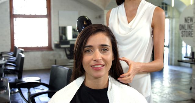 Woman Receives Hair Styling at Modern Salon - Download Free Stock Images Pikwizard.com