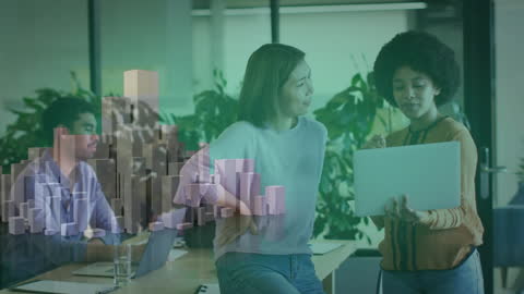 Colleagues Collaborate with Digital Technology in Urban Office