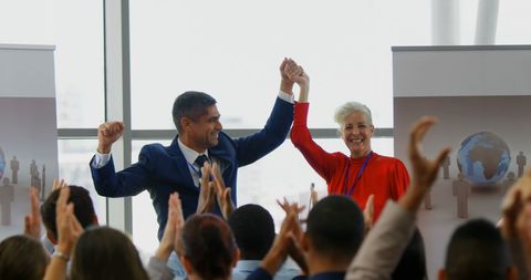 Successful Business Leaders Celebrating Achievement at a Seminar