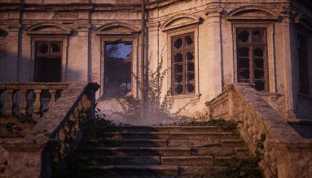 Overgrown abandoned victorian manor entrance with cracked windows moss-covered stone steps