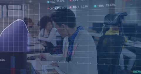 Young Professional Analyzing Stock Market Data in Modern Office