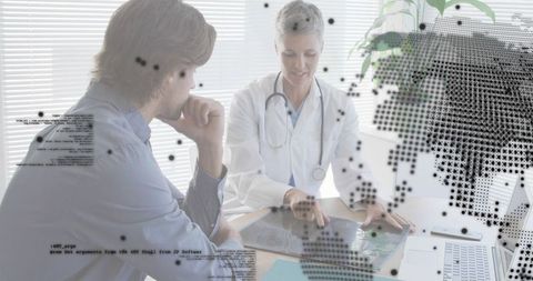 Clinician reviewing radiograph with patient using tablet for diagnostic consultation