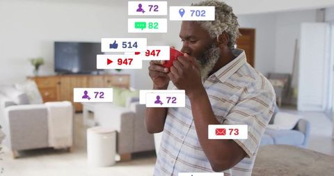 Man Enjoying Coffee Amidst Social Media Icons at Home