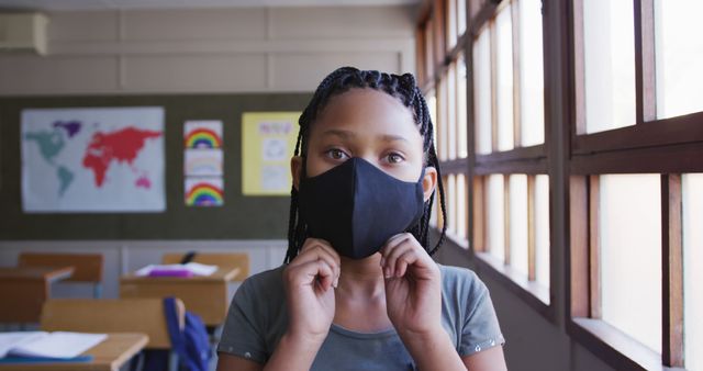 Young Student in Classroom Wearing Face Mask - Download Free Stock Images Pikwizard.com