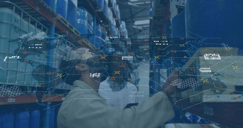 Warehouse manager using tablet with inventory map overlay for supply chain audit