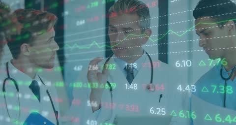 Doctors Analyzing Financial Trends in Medical Subsidiary Context