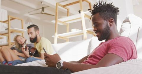 Young People Enjoying Relaxing Weekend at Cozy Home