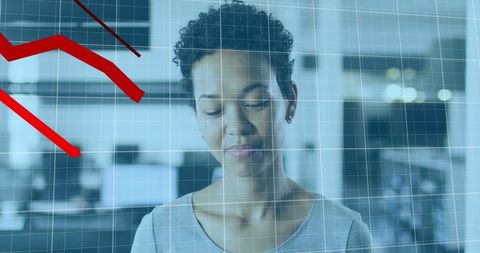 Businesswoman Analyzing Declining Financial Data