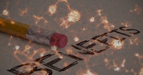 Erasing bullies text with pencil eraser closeup fractal glow anti-bullying concept