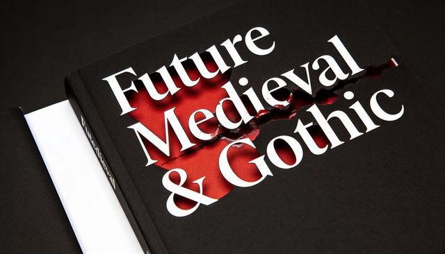 Torn black hardcover typography book white serif title revealing red interior